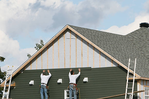 Professional Emergency Siding Repair technician working in Massapequa Park, NY